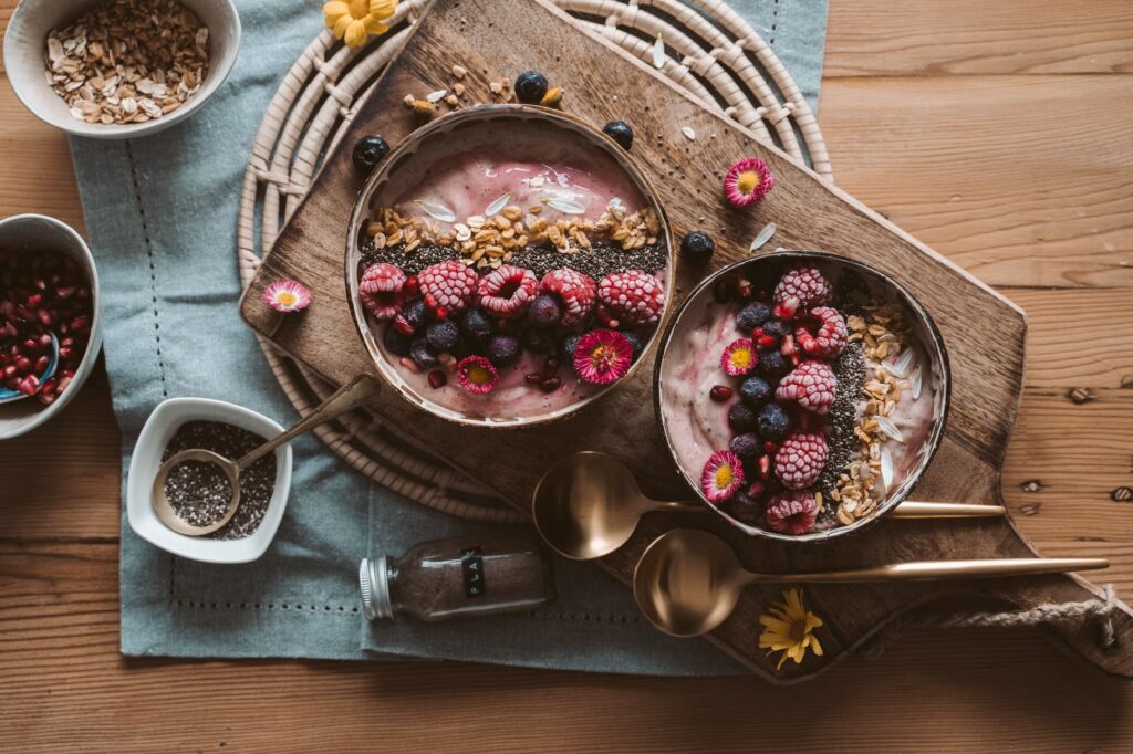 photo of fruits and smoothie on a bowl